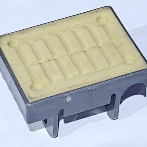 Conveyor chain track pad